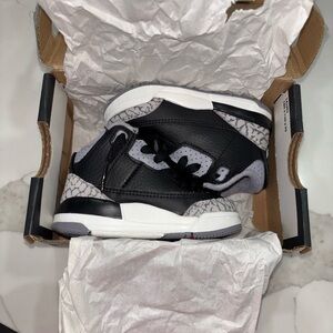 Jordan Kids Black and White Sneakers